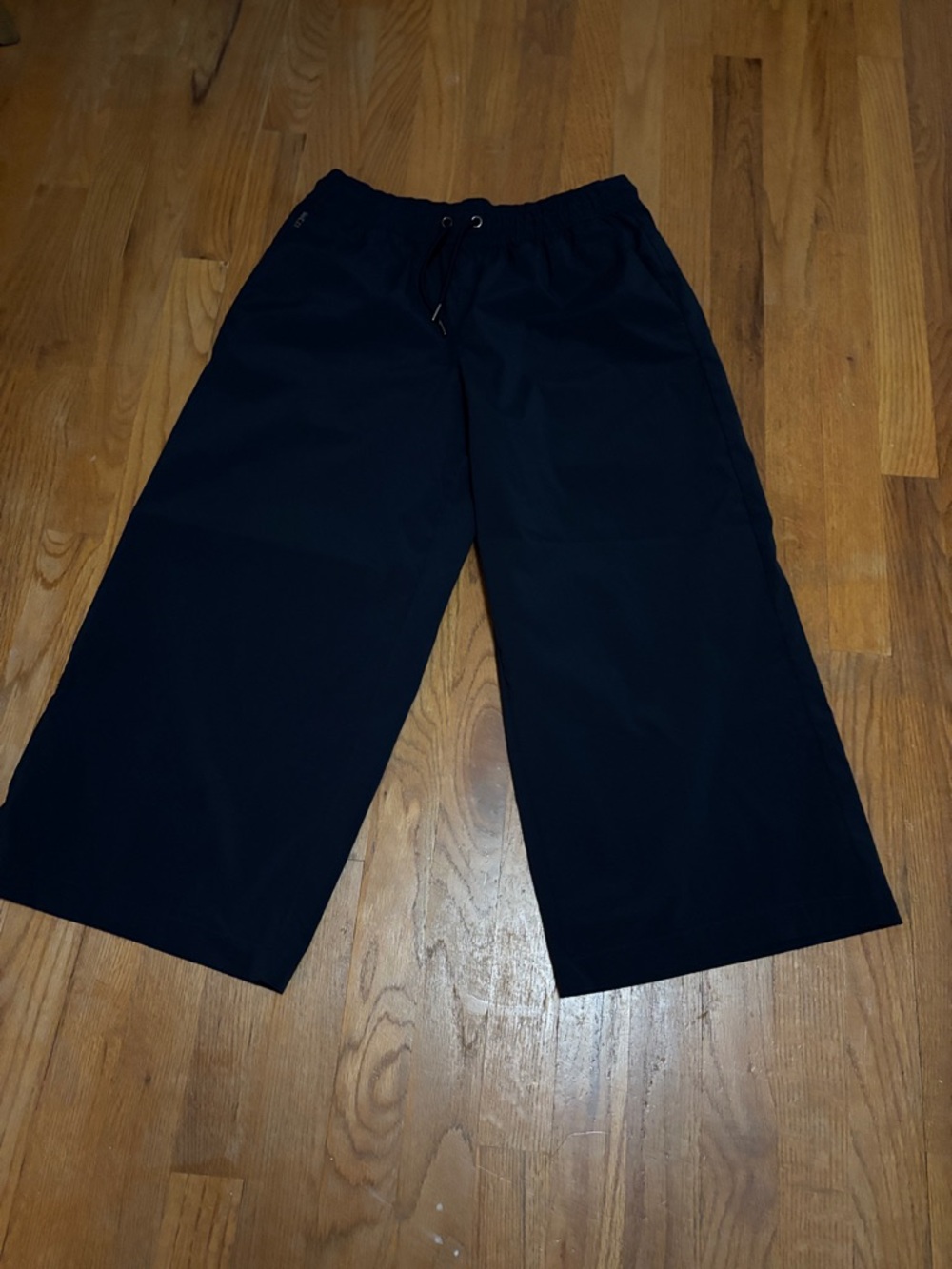 Athleta Women's Wide-Leg Drawstring Pants in navy blue.